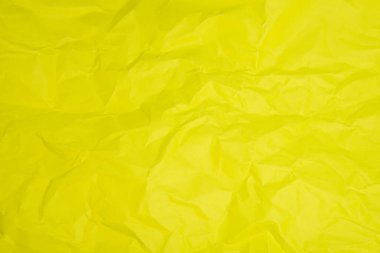 Buruşmuş boş parlak sarı kağıt dokusu