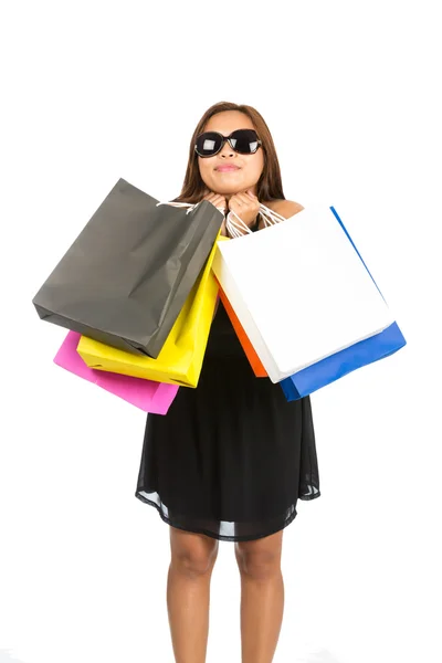 Asian Female Hugging Shopping Bags Head Tilted — Stock Photo, Image