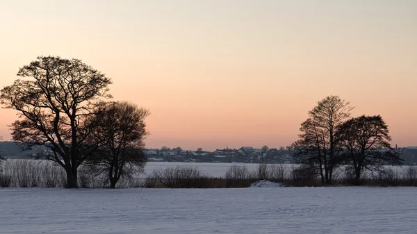 Coucher de soleil sur le lac gelé — Photo