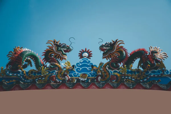 Chinese style dragon statue Chinese art style Temple Roof in shrines or temples