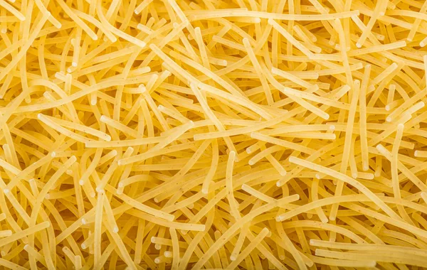 Vermicelli grezzi sfondo — Foto Stock