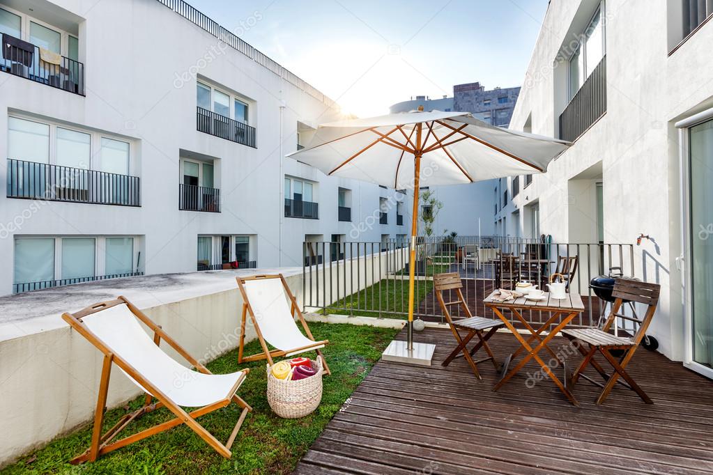 Small balcony in middle of apartment complex