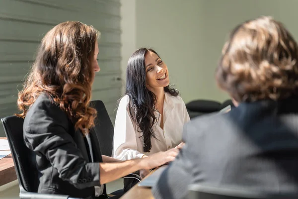 Diversity Business, Job and Workplace concept. Portrait of happy and smiling caucasian businesswoman meeting with colleague in office.