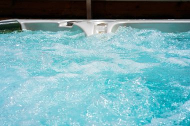 View of the open working hot tub clipart