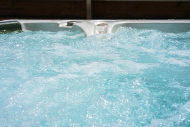 View of the open working hot tub clipart