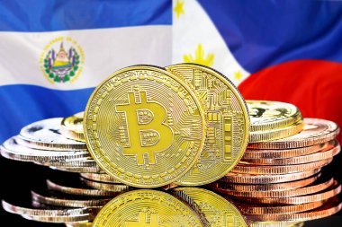 El Salvador ve Filipinler 'deki kripto para birimi ve engelleme teknolojisi yatırımcıları için konsept. El Salvador ve Filipinler bayrağının arka planında Bitcoinler