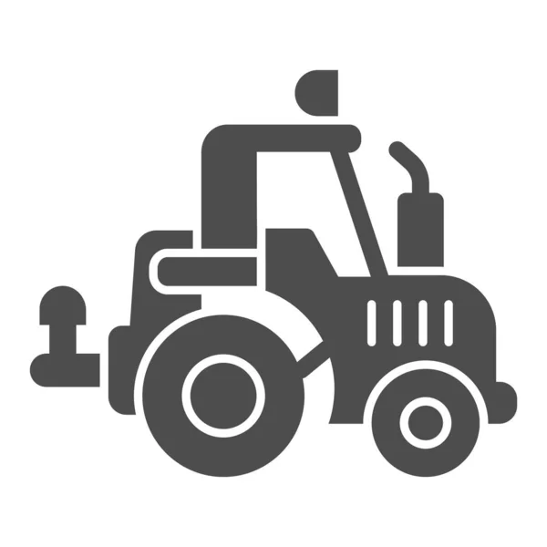 Icono sólido del tractor, concepto de equipo pesado, signo de máquina agricultor sobre fondo blanco, icono de agrimotor en estilo glifo para el concepto móvil y el diseño web. Gráficos vectoriales. — Vector de stock