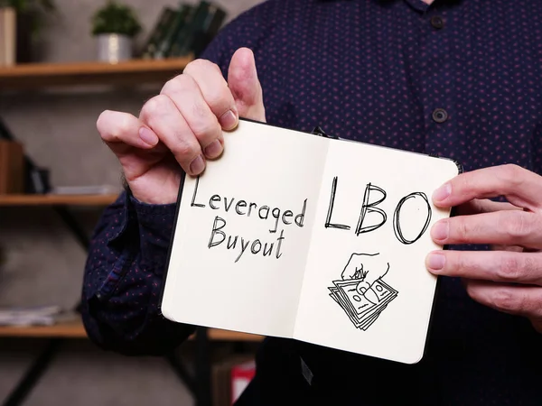 Leveraged Buyout LBO is shown on the business photo using the text — Stock Photo, Image