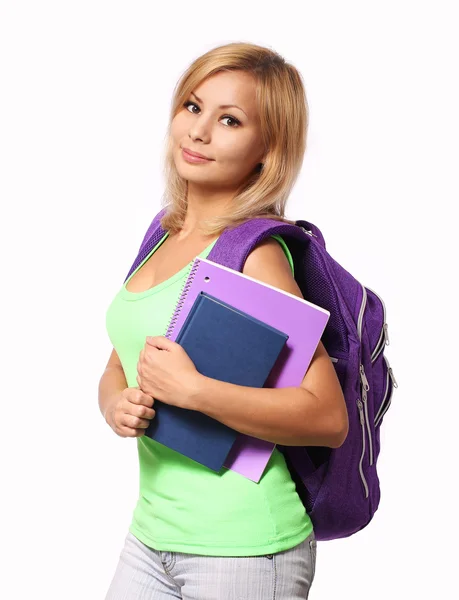 Estudante menina com mochila e livros isolados em branco — Fotografia de Stock