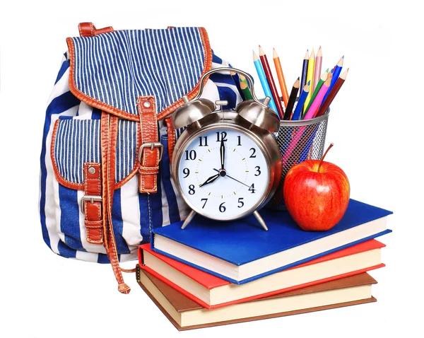 Books, apple, backpack, alarm clock and pencils isolated — Stock Photo, Image