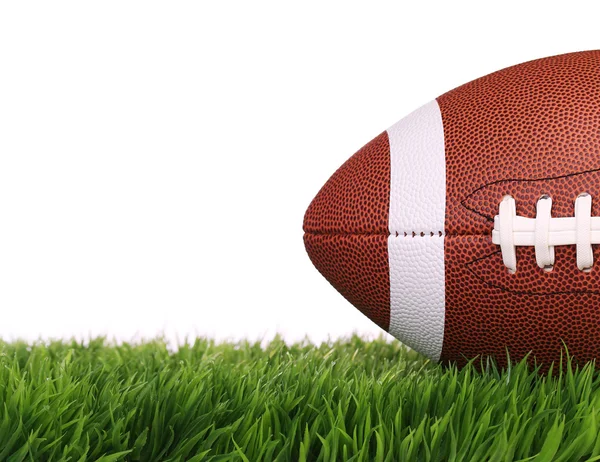 American Football. Ball on Green Grass, isolated on white — Stock Photo, Image