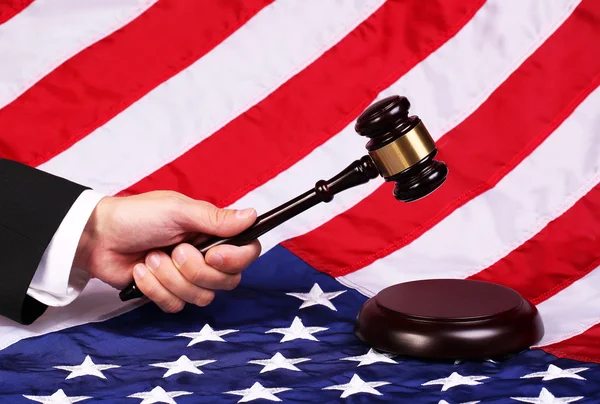 Gavel on Judge Hand over American Flag — Stock Photo, Image