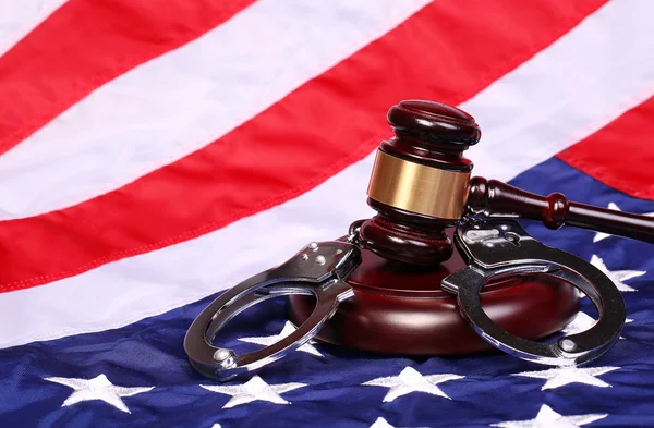 Judge Gavel and Handcuffs over American Flag — Stock Photo, Image