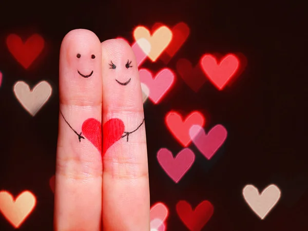 Happy Couple Concept. Two fingers in love with painted smiley fa — Stock Photo, Image