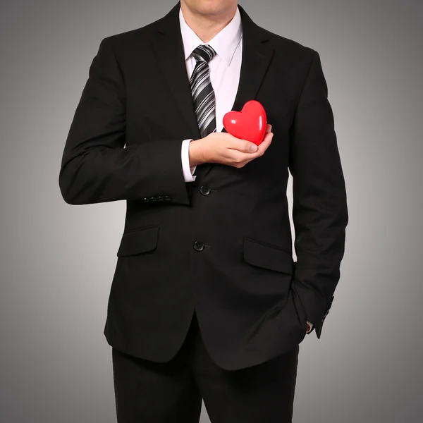 Man in suit with red heart. Valentine's Day — Stock Photo, Image