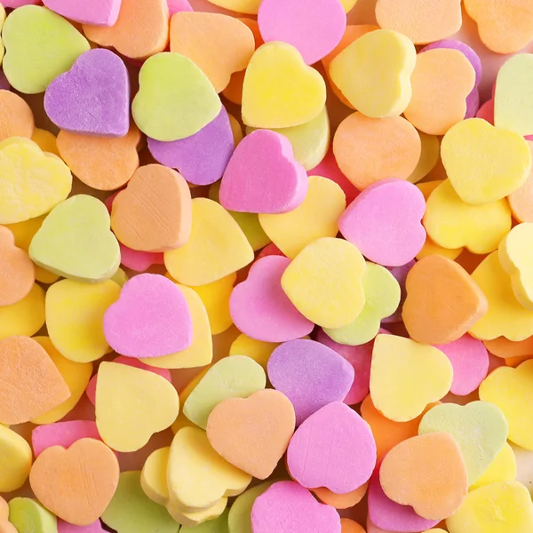 Kleurrijke snoep harten. Achtergrond — Stockfoto