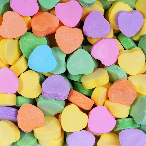 Bunte Herzen Hintergrund. Süßigkeiten. Valentinstag — Stockfoto