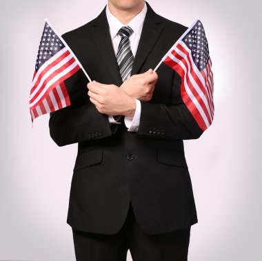 Amerikan bayrakları ile işadamı 