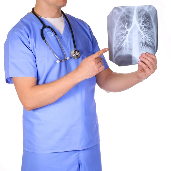 Doctor con estetoscopio examinando fotos de rayos X aisladas en blanco — Foto de Stock