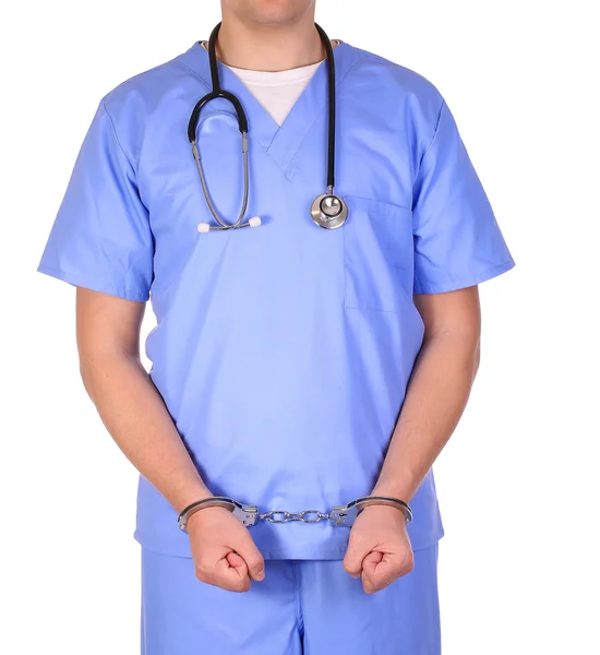 Doctor with stethoscope in handcuffs isolated on white — Stock Photo, Image