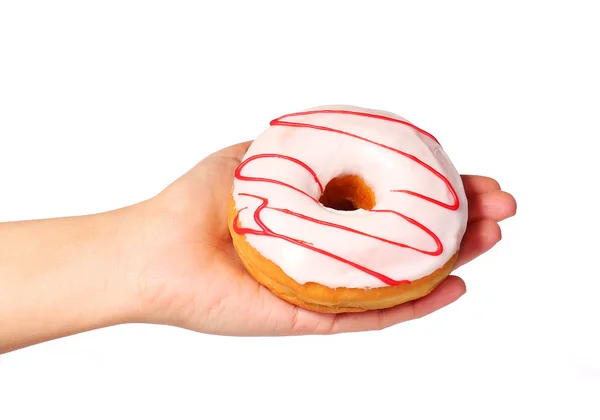 Donut in hand geïsoleerd op witte achtergrond — Stockfoto