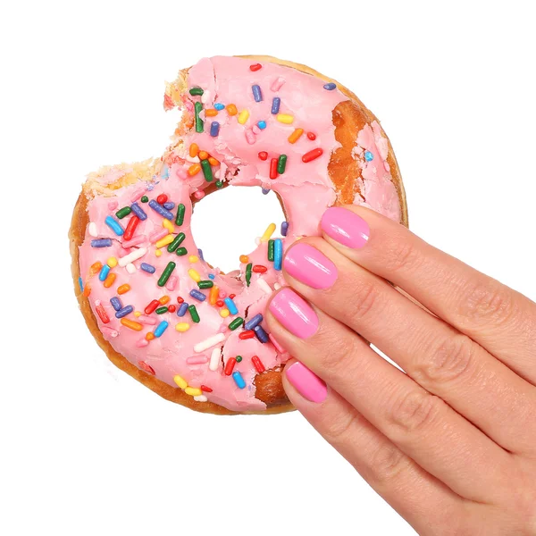 Beyaz izole kadın elinde Sprinkles ile ısırıldı Donut — Stok fotoğraf