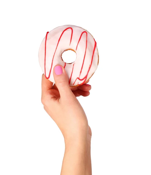 Donut in hand isolated on white background — Stock Photo, Image