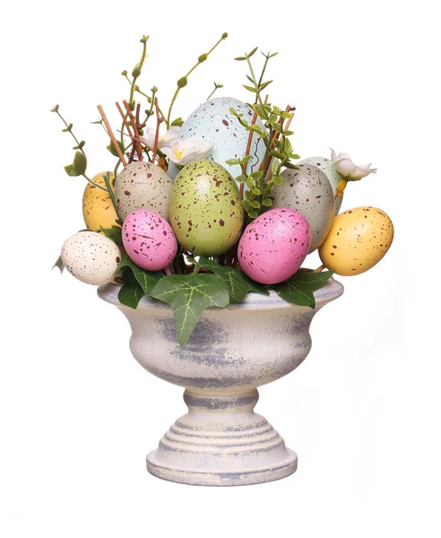 Colorful easter eggs in vase isolated on white. — Stock Photo, Image