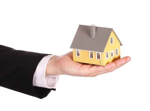 House model in businessman's hand isolated on white. Mortgage — Stock Photo, Image