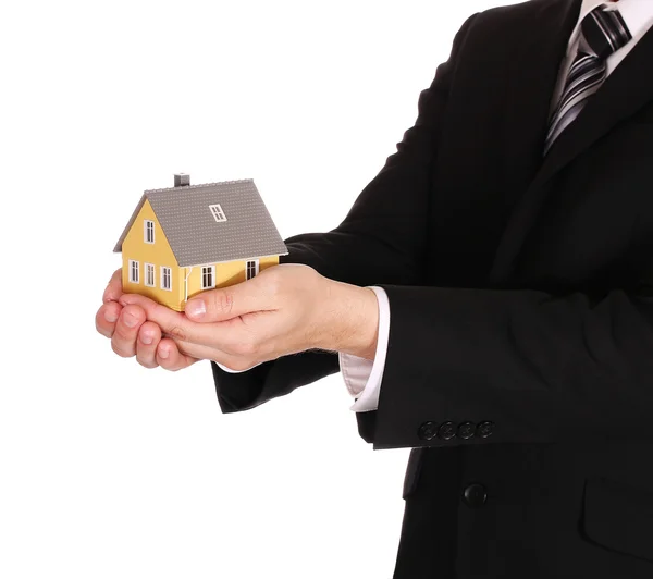 House model in businessman's hands isolated on white. Mortgage — Stock Photo, Image