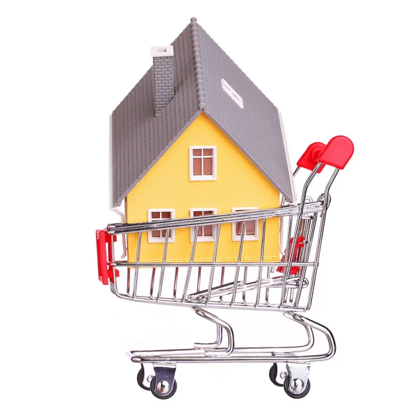 House in shopping cart isolated. Mortgage concept — Stock Photo, Image