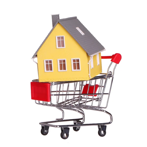 House in shopping cart isolated. Mortgage concept — Stock Photo, Image