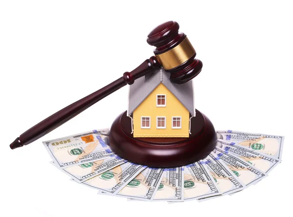 Concept of house sale with gavel and money isolated on white — Stock Photo, Image