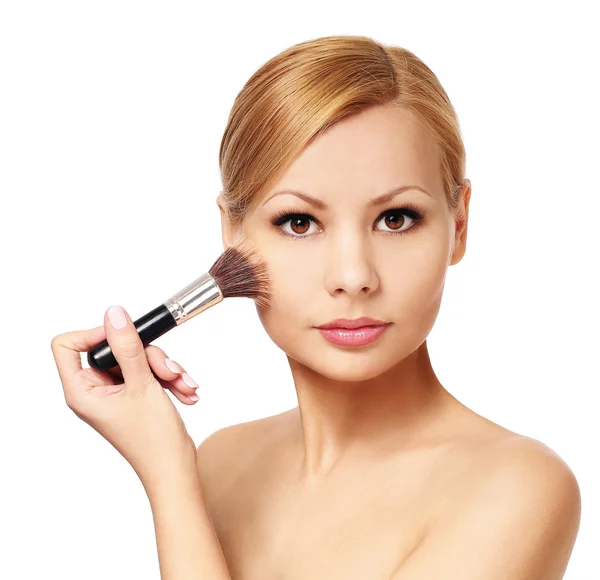 Beautiful woman with makeup brush isolated on white. Blonde girl — Stock Photo, Image