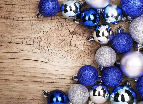 Blue Christmas balls op houten achtergrond — Stockfoto