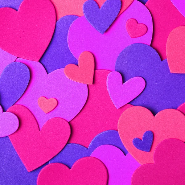 Valentýna pozadí. Barevné papírové srdce — Stock fotografie