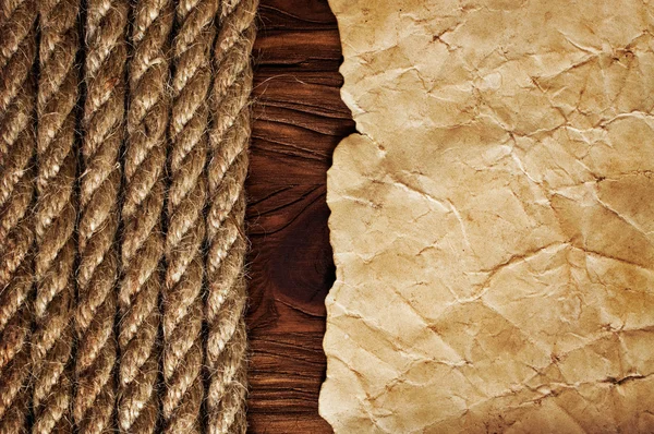 Jute eller hampa rep och antika pergament eller karta — Stockfoto