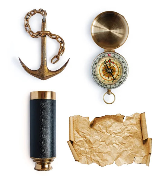 Anchor, telescope, compass and map or parchment — Stock Photo, Image