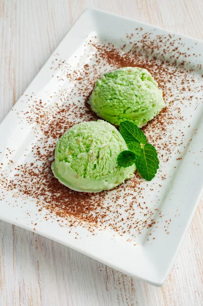 Green pistachio ice cream scoops — Stock Photo, Image