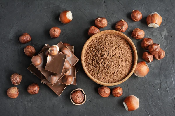 Chocolate with hazelnut and cocoa powder — Stock Photo, Image