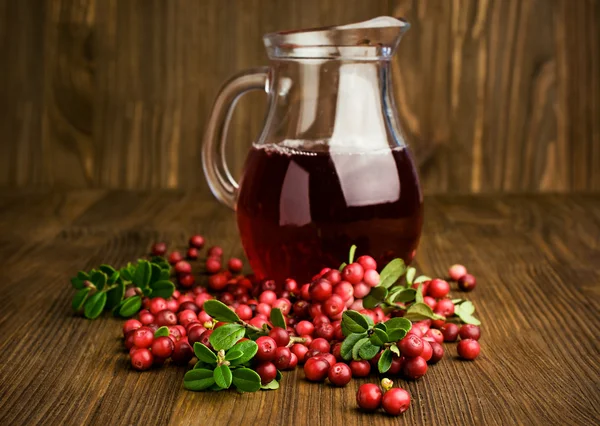 Cranberry juice and cranberries — Stock Photo, Image