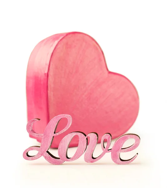 Pink box in heart shape with word love — Stock Photo, Image