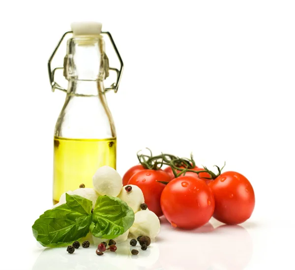 Ingredients for Caprese : mozzarella , tomato and oil — Stock Photo, Image