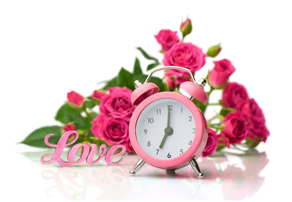 Valentine's Day.Pink roses and alarm clock — Stock Photo, Image