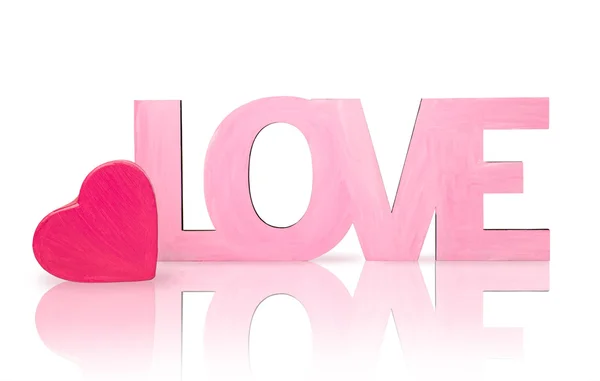Roze woord "love" met een doos in de vorm van hart — Stockfoto