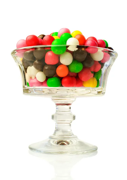 Colorful round candy in a glass vase — Stock Photo, Image