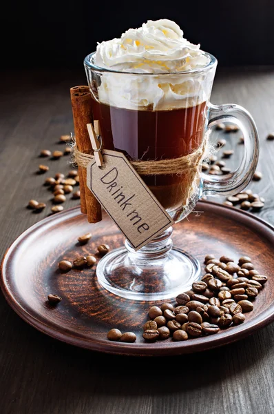 Coffee with cinnamon and whipped cream — Stock Photo, Image