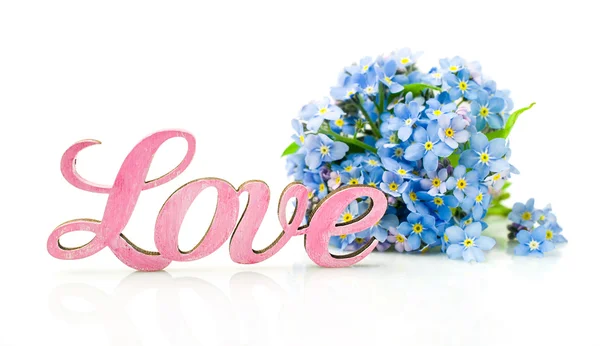 Esqueça-me-não flores e palavra "amor " — Fotografia de Stock