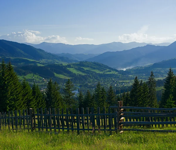 Rural landscape at early morning with mountains — Stock Photo, Image