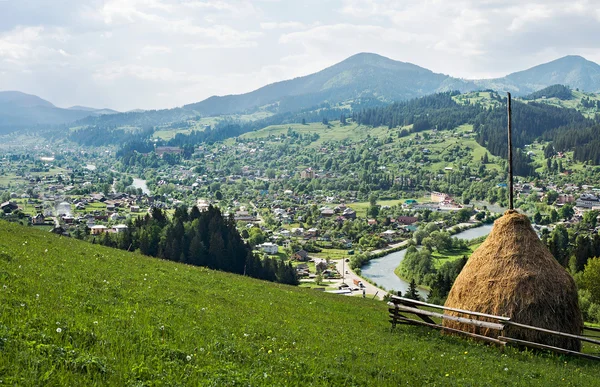 Haystack on a background mountains — Stock Photo, Image